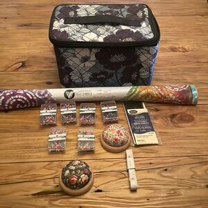 Sewing box, fabric, pins, hem tape, measuring tape